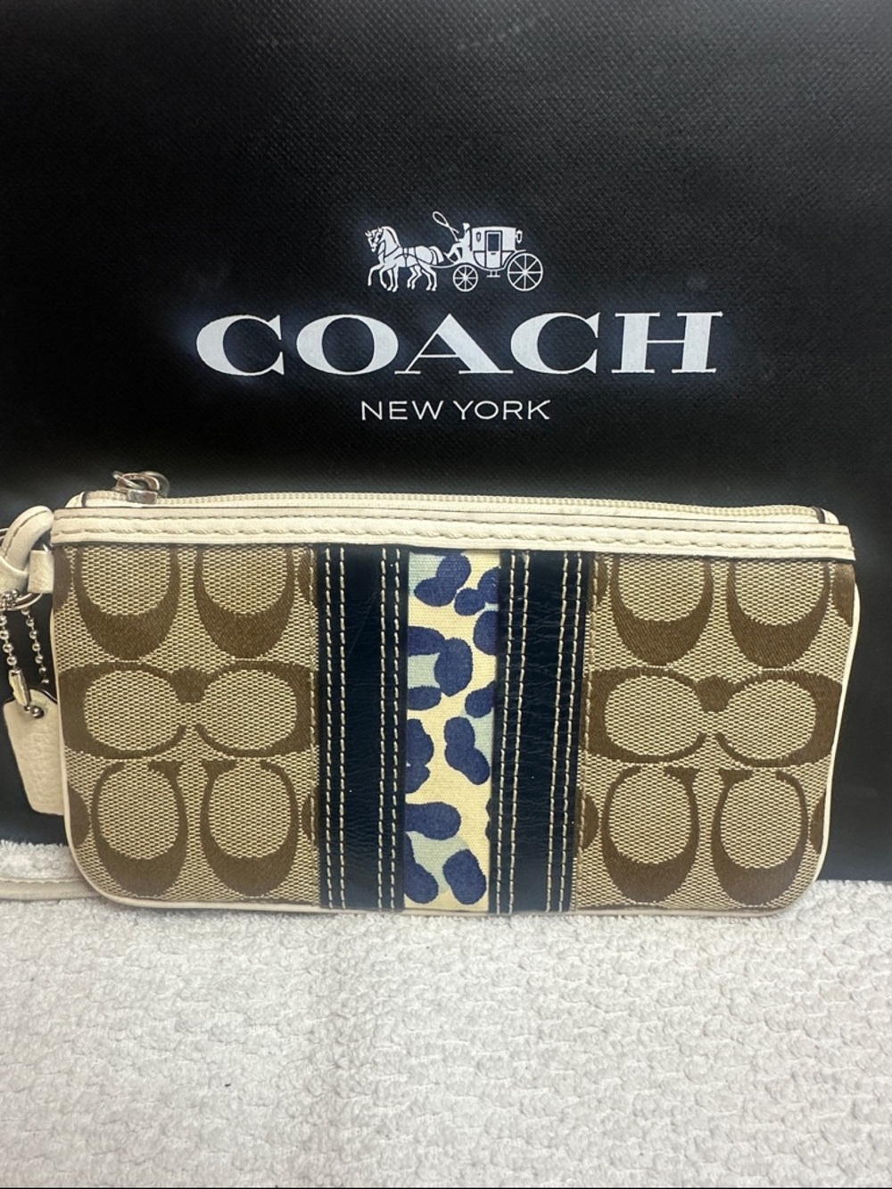 Coach Tan Signature Canvas Wristlet with Navy and Cream Accents - Picture 2 of 9